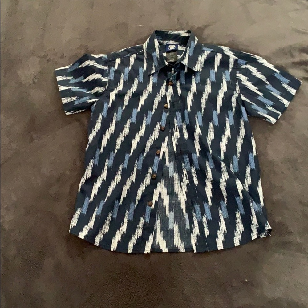 A blue button up dress shirt